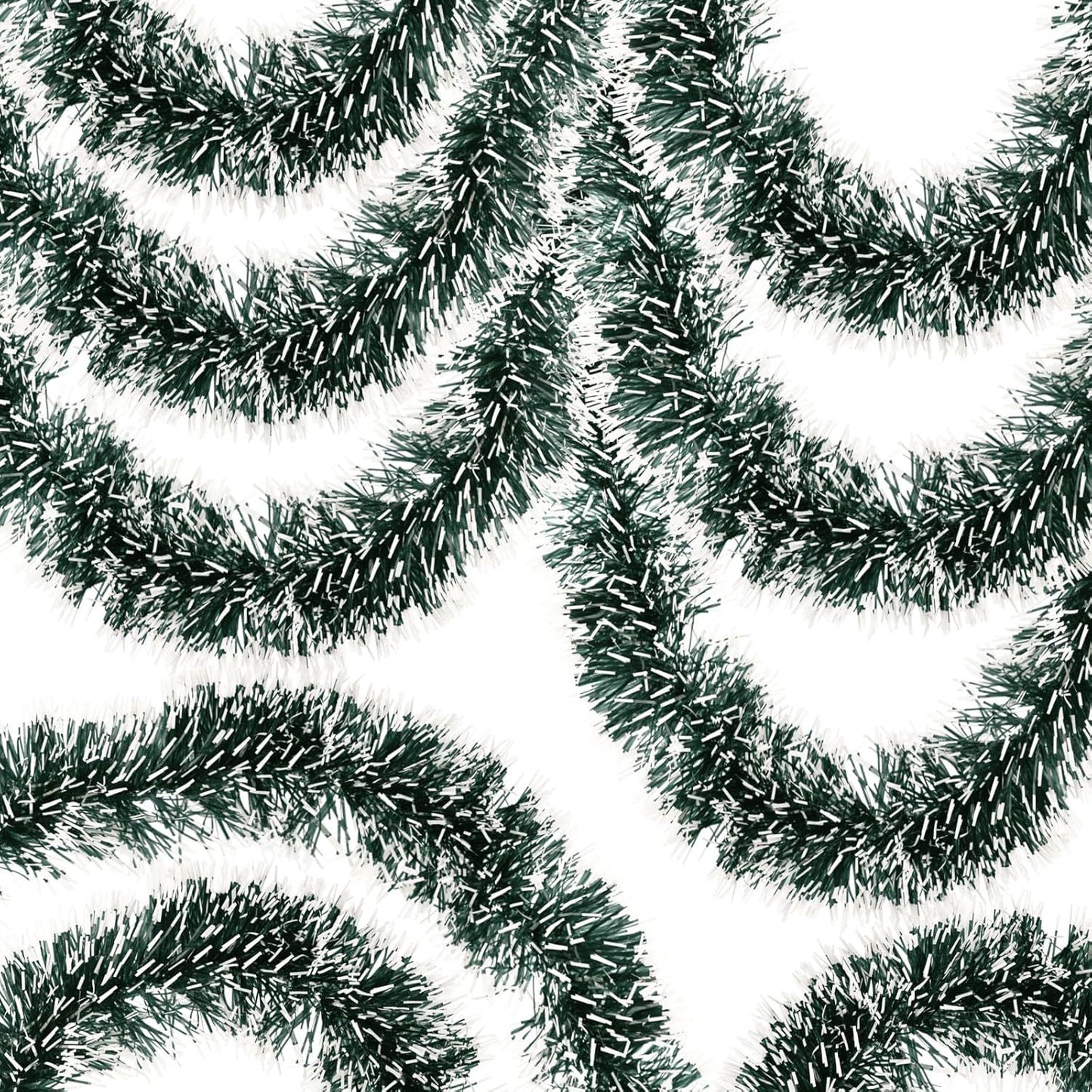 Close-up of green tinsel on a white background