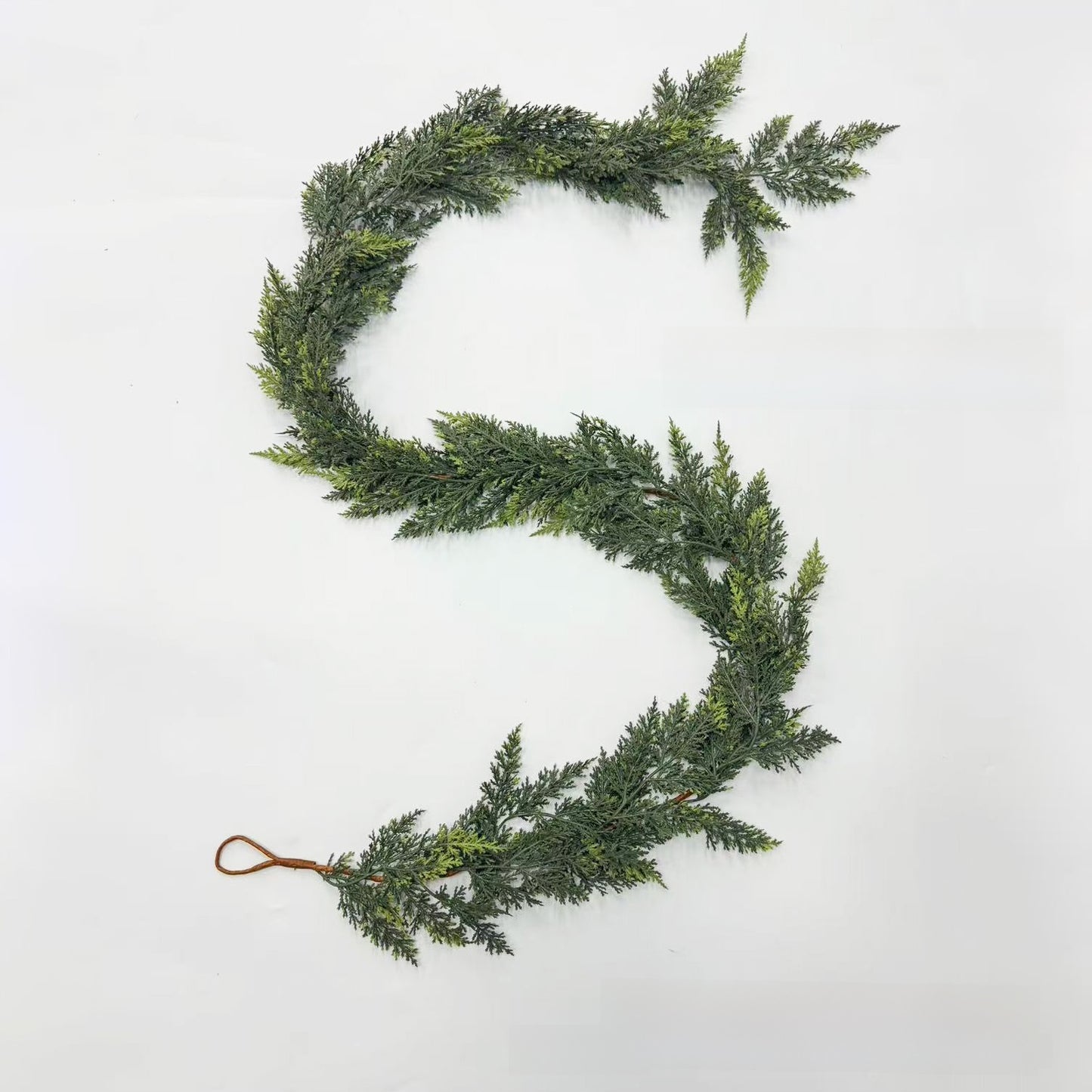Green leafy garland on a white background