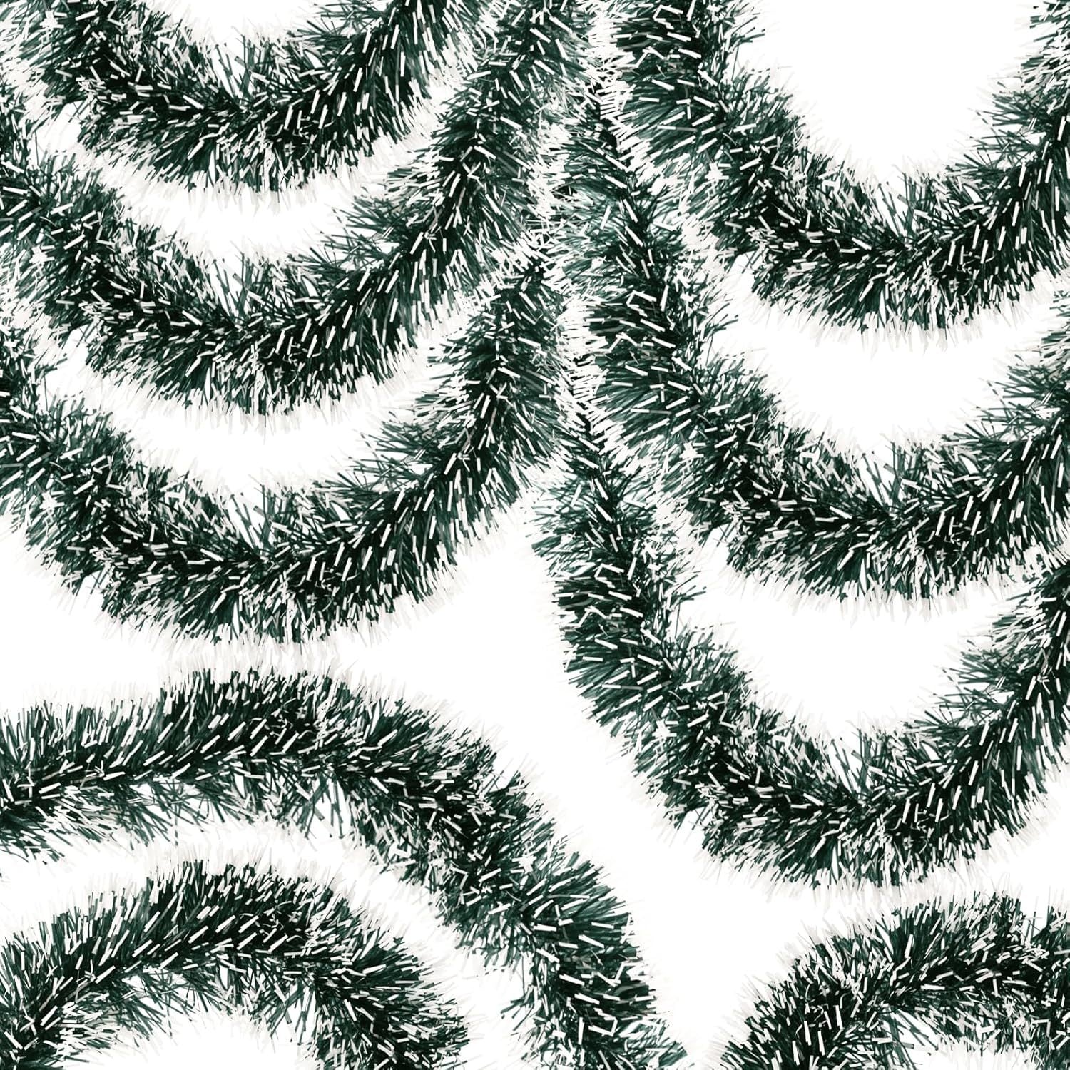 Close-up of green tinsel on a white background