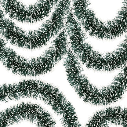 Close-up of green tinsel on a white background