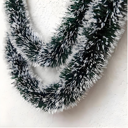 Decorative wreath with snow-like texture on a white background
