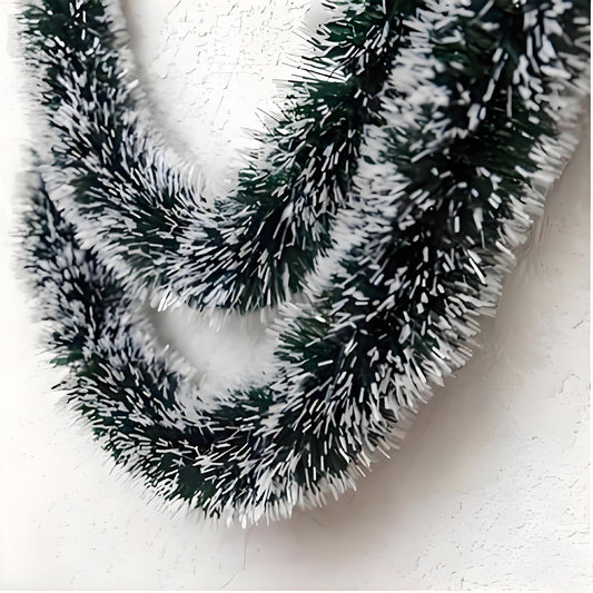 Decorative wreath with snow-like texture on a white background