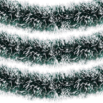 Green and white tinsel garland on a white background