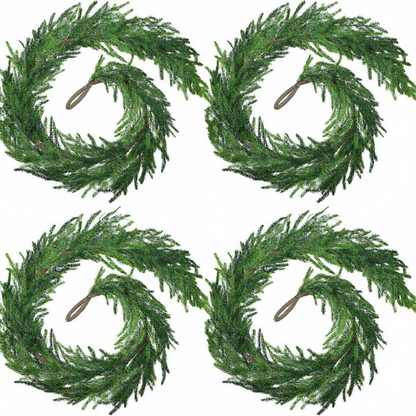 Four green wreaths on a white background